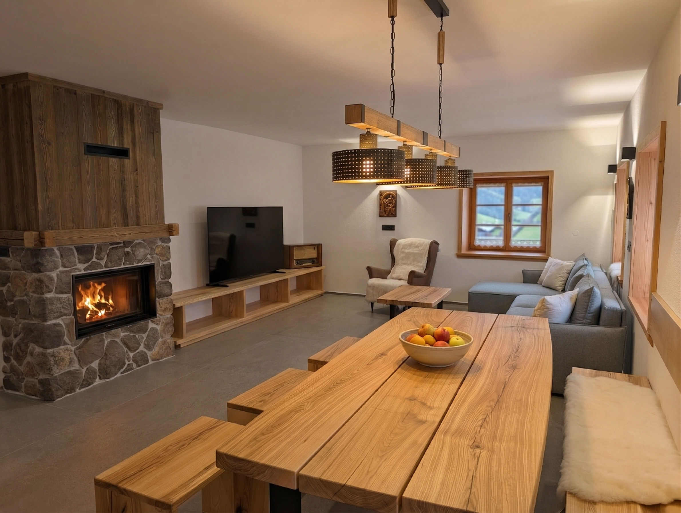 Living room with fireplace at Alpine House 77
